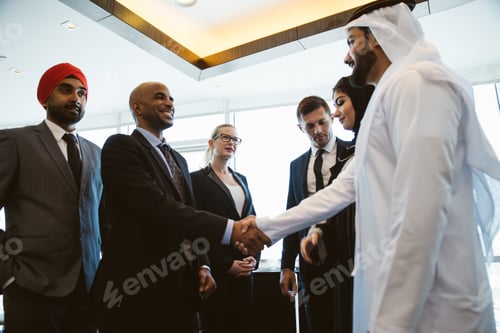 Preview: Mixed business team making agreements on future business plans. in the office
