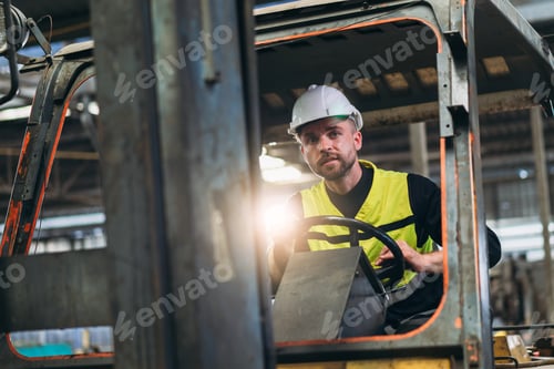 Preview: Industrious Engineer Operating Forklift in Warehouse. Efficient Forklift Driving in Factory.