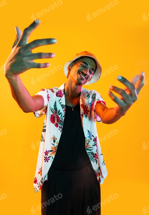 Preview: African man portrait in studio on colorful background