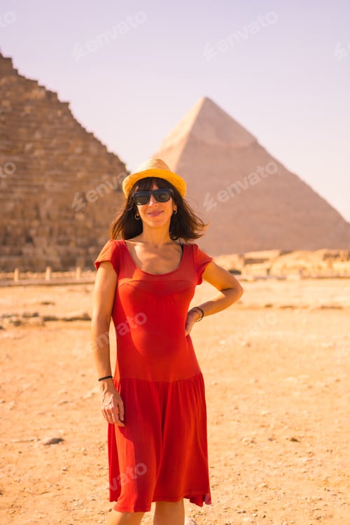 Preview: Portrait Of A Young Girl In Red Dress At The Pyramid Of Cheops The Largest Pyramid. The Pyramids Of