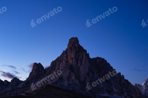 Preview: View of the mountains silhouette and high cliffs during sunset. Natural landscape.