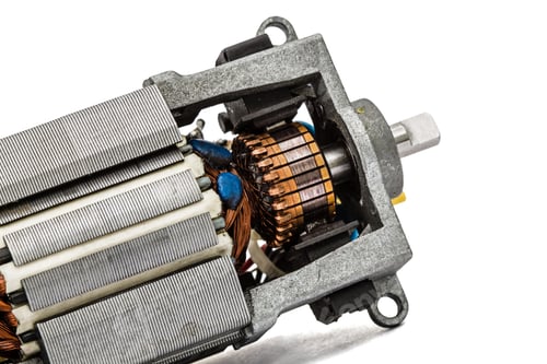 Preview: Part of small electric motor, close-up, isolated on white background