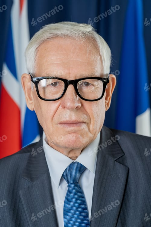 Preview: Serious senior politician in eyeglasses and suit