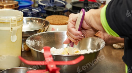 Preview: Woman kneads dough for making pancakes. Step by step recipe.