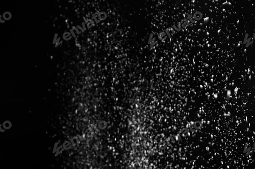 Preview: Snow flakes falling on black background. Winter weather