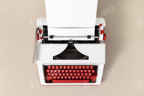 Preview: Top view of a retro typewriter with blank white paper