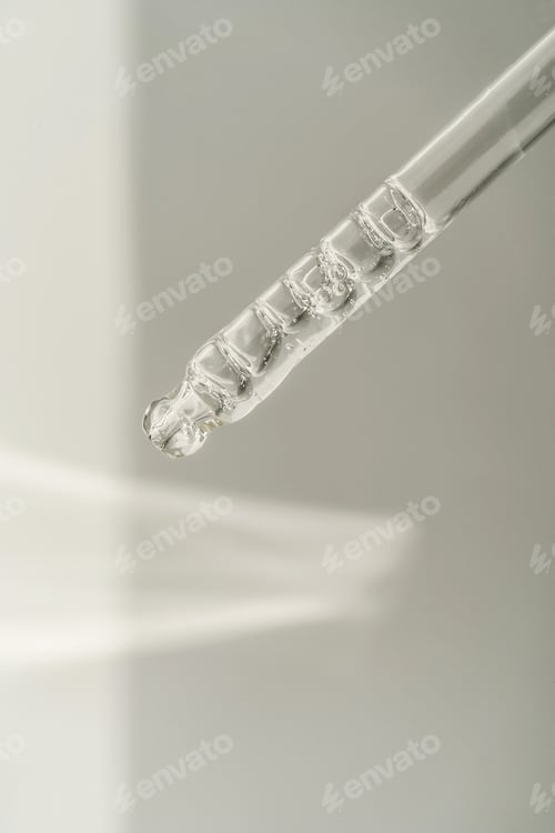 Preview: Pipette with bubbles on a white background.