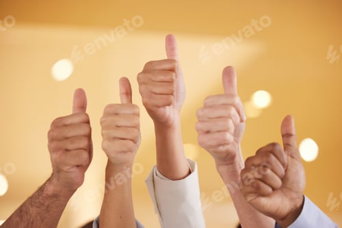 Preview: Closeup shot of a group of unrecognisable businesspeople showing thumbs up in an office