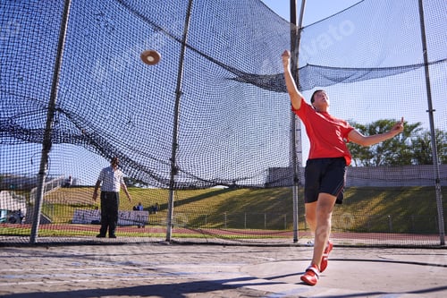 Preview: This ones a record breaker. Shot of a young sportsman throwing a discus.
