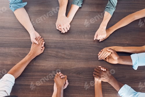 Preview: Top view, holding hands or mental health support in group therapy meeting for psychology, trust or
