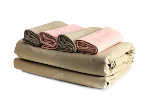Preview: Stack of clean bed sheets isolated on white