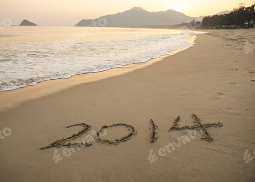 Preview: Year 2014 Hand Written On The White Sand In Front Of The Sea