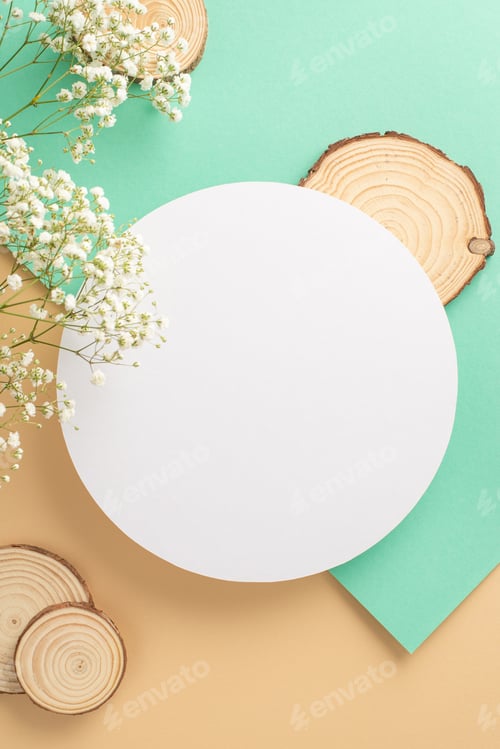 Preview: Herbal natural products concept. Above view photo of empty circle surrounded by white gypsophila