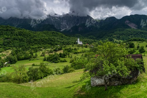 Preview: Idyllic Dreznica Village and Towering Mount Krn in Scenic Slovenian Landscape