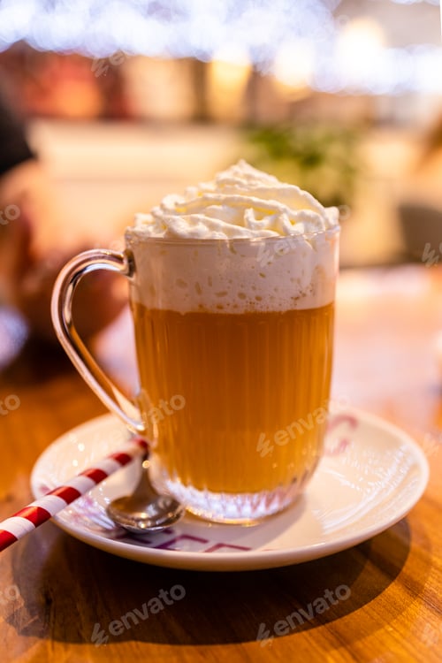 Preview: butter beer cocktail with whipped cream close up