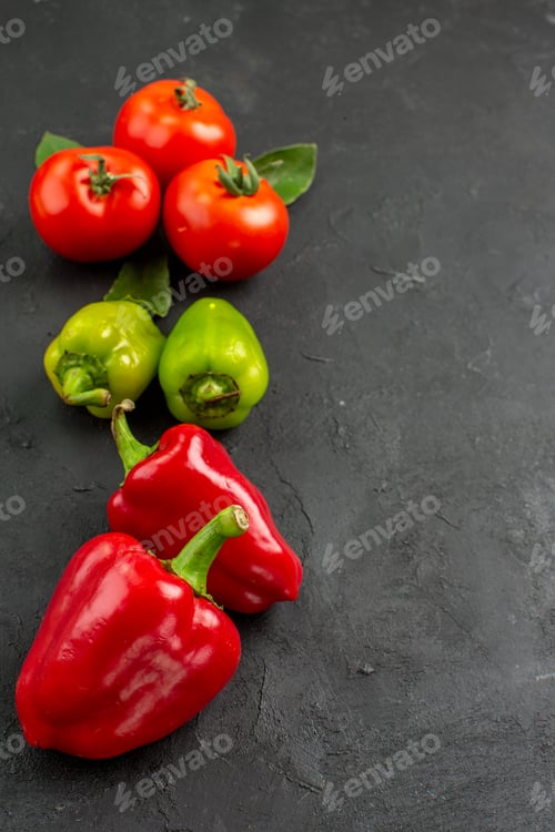 Preview: front view fresh red tomatoes with bell-peppers on a dark background color salad ripe
