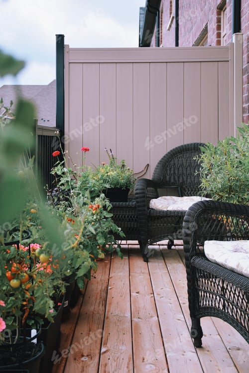 Preview: Balcony with outdoor furniture, tomato plants and flowers