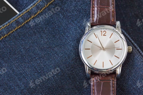 Preview: Wristwatch on denim jeans pocket