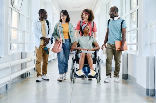 Preview: Girl with disability with her friends at school