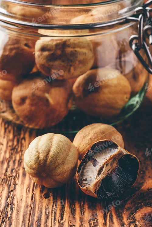 Preview: Dried limes on wooden table
