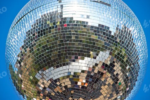 Preview: Disco ball hanging outdoors