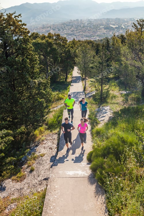 Preview: Young men and women running in park, Split, Dalmatia, Croatia