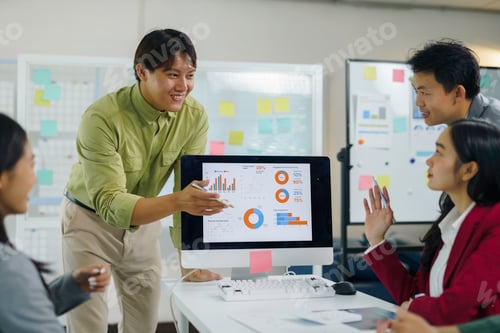 Preview: Asian business team analyzing data during presentation meeting