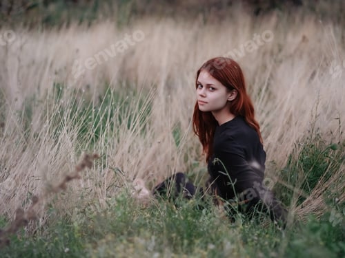Preview: woman in the field lies on the grass freedom leisure lifestyle