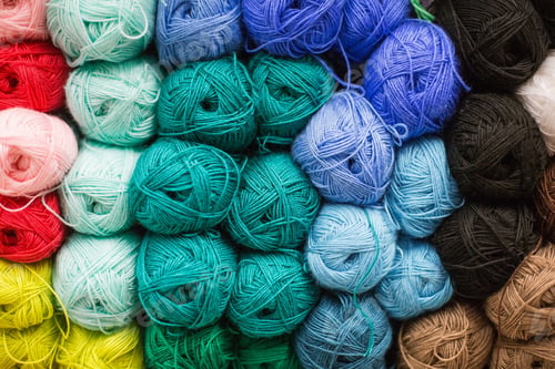 Preview: Colored balls of yarn. Knitting needles. Crocheting yarn