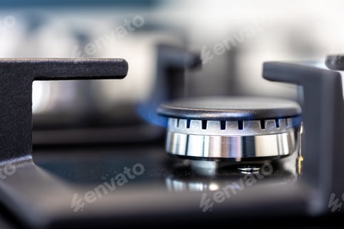 Preview: Gas burner macro. Flame detail. Modern kitchen surface.