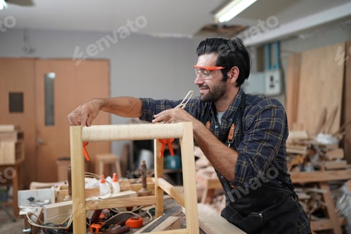 Preview: Carpenters Assembling Furniture