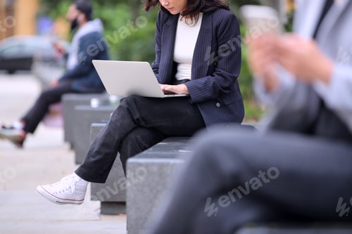 Preview: Close Up Of Businesswoman Outdoors Working On Laptop During Break From The Office