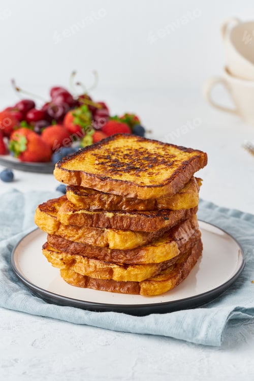 Preview: French toasts with berries, brioche breakfast, white background, vertical closeup