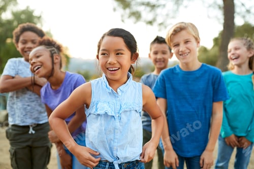 Preview: Group Of Multi-Cultural Children Posing And Hanging Out With Friends In Countryside Together
