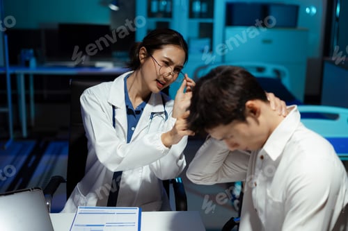Preview: doctor talking with man patient for monitoring and check up after surgery.
