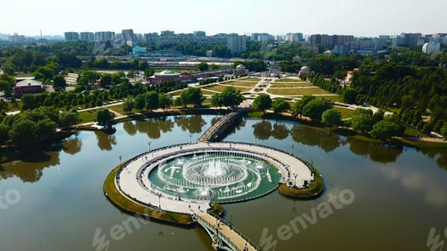 Preview: Top view of fountain in pond and historical palace. Creative. Amazing fountain in lake with