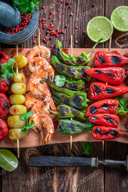 Preview: Hot roasted skewer made of mediterranean seafood and vegetables.