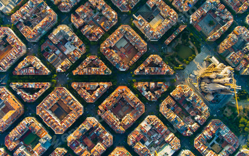 Preview: Aerial view of Barcelona Eixample residential district and Sagrada Familia Basilica at sunrise