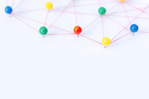 Preview: The connection between the two networks. Network simulation on paper linked together by yarn