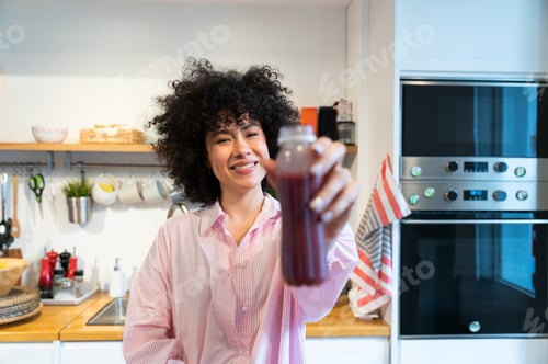 Preview: Beautiful latino woman at home