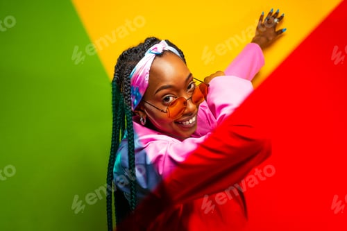 Preview: Beautiful afro woman with pigtails and stylish clothes