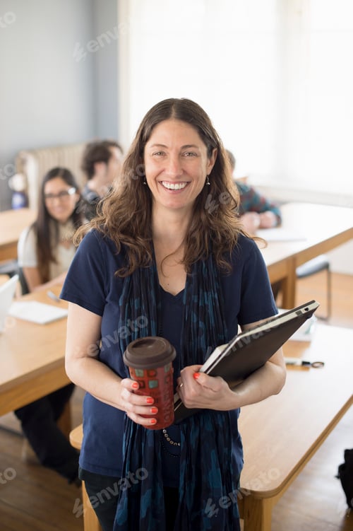Preview: Teacher with notebook and coffee, portrait