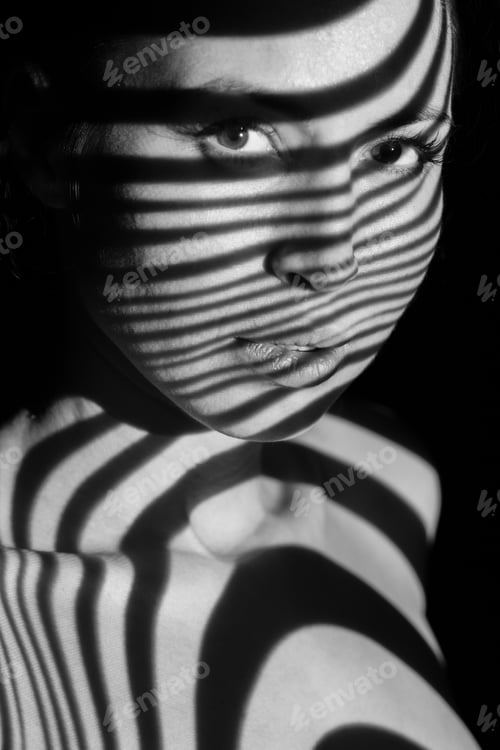 Preview: The Face Of Nude Woman With Black And White Zebra Stripes. Black-And-White Photo Created With The