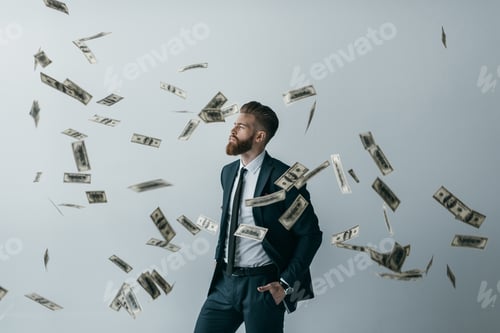 Preview: portrait of stylish businessman with falling dollar banknotes isolated on grey