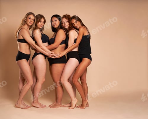 Preview: Group of women in black underwear bonding and smiling towards the camera