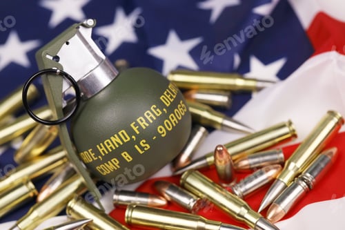 Preview: M67 frag grenade and many yellow bullets and cartridges on United States flag