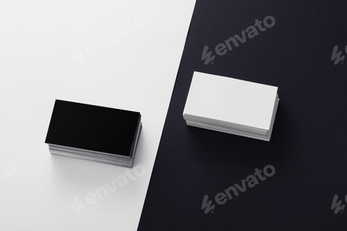 Preview: black and white blank business cards stacked on black and white background