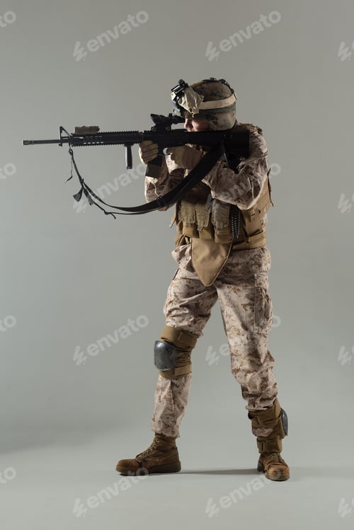 Preview: Soldier aiming firearm in tactical setup during training session