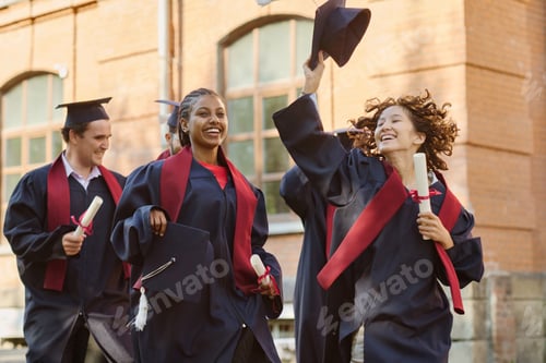 Preview: Graduated students running along the campus