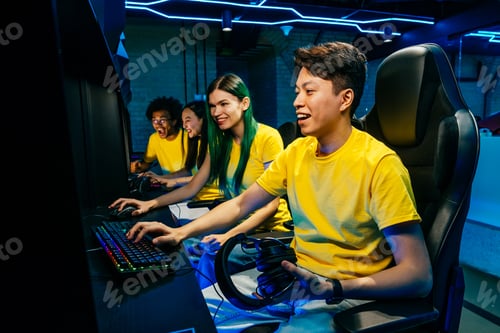 Preview: Multiethnic group of young friends playing videogames